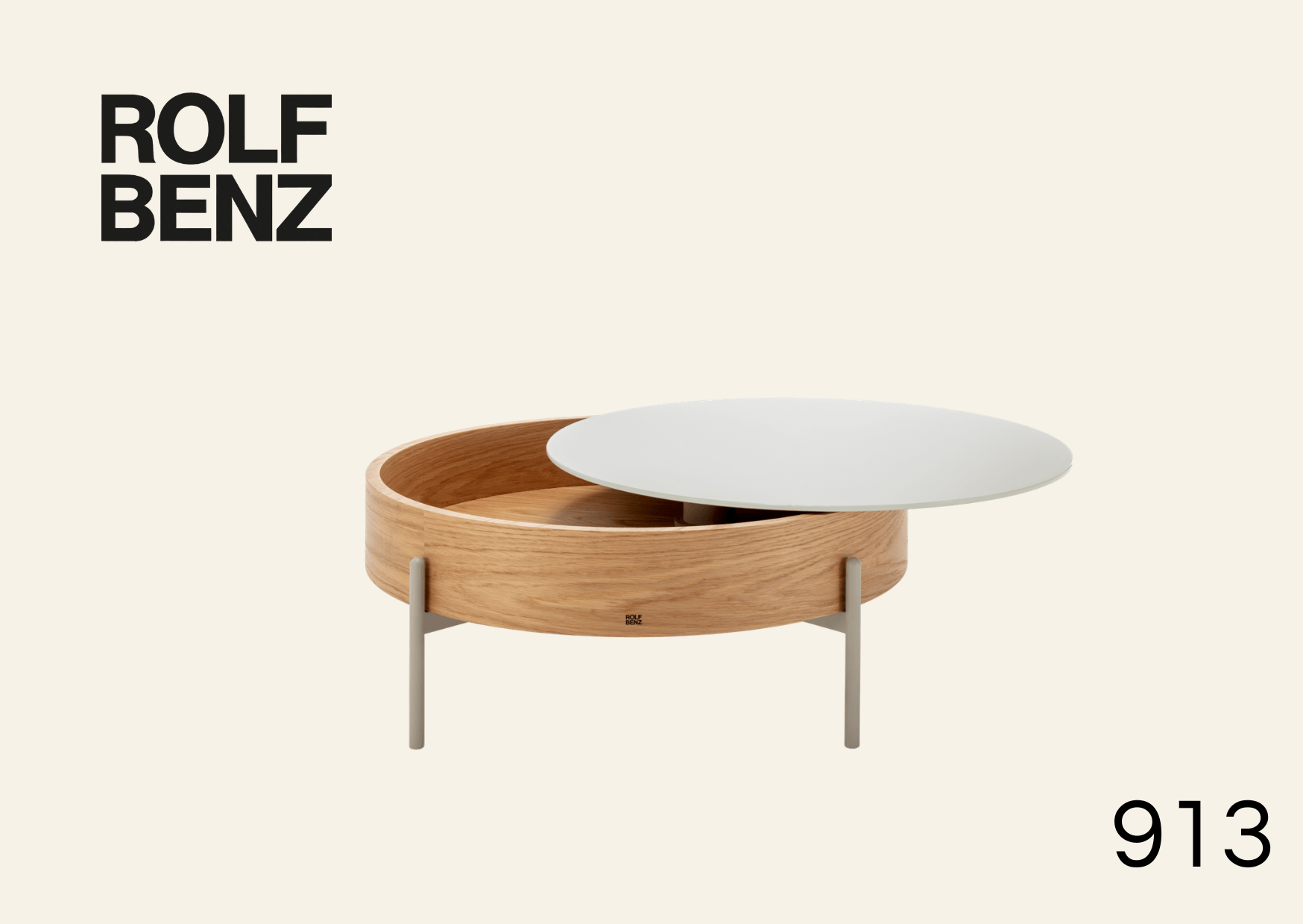 runder Holz-Couchtisch mit verschiebbarerr Tischplatte in weiß. Aufschrift: Rolf Benz 913.
