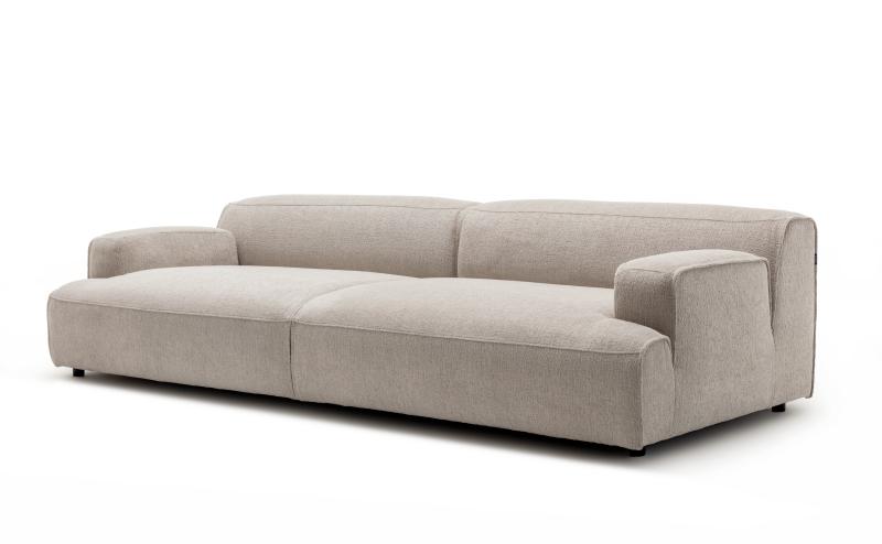 modernes graues Loungesofa vor weißem Hintergrund