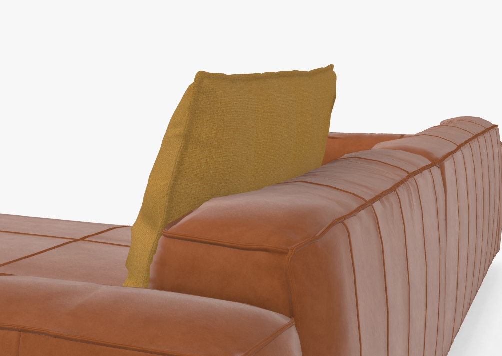 Ein braunes Ledersofa mit einem beigefarbenen Kissen im Fokus der Aufnahme. Die Oberfläche des Sofas zeigt feine Nähte und ein luxuriöses Design.