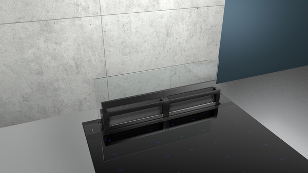 Kochplatte mit Glasabdeckung und integriertem Lüftungssystem in moderner Küche