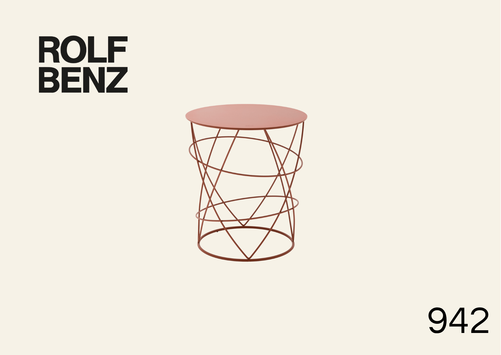 filigraner Beistelltisch in rosa. Bildaufschrift: Rolf Benz 942.