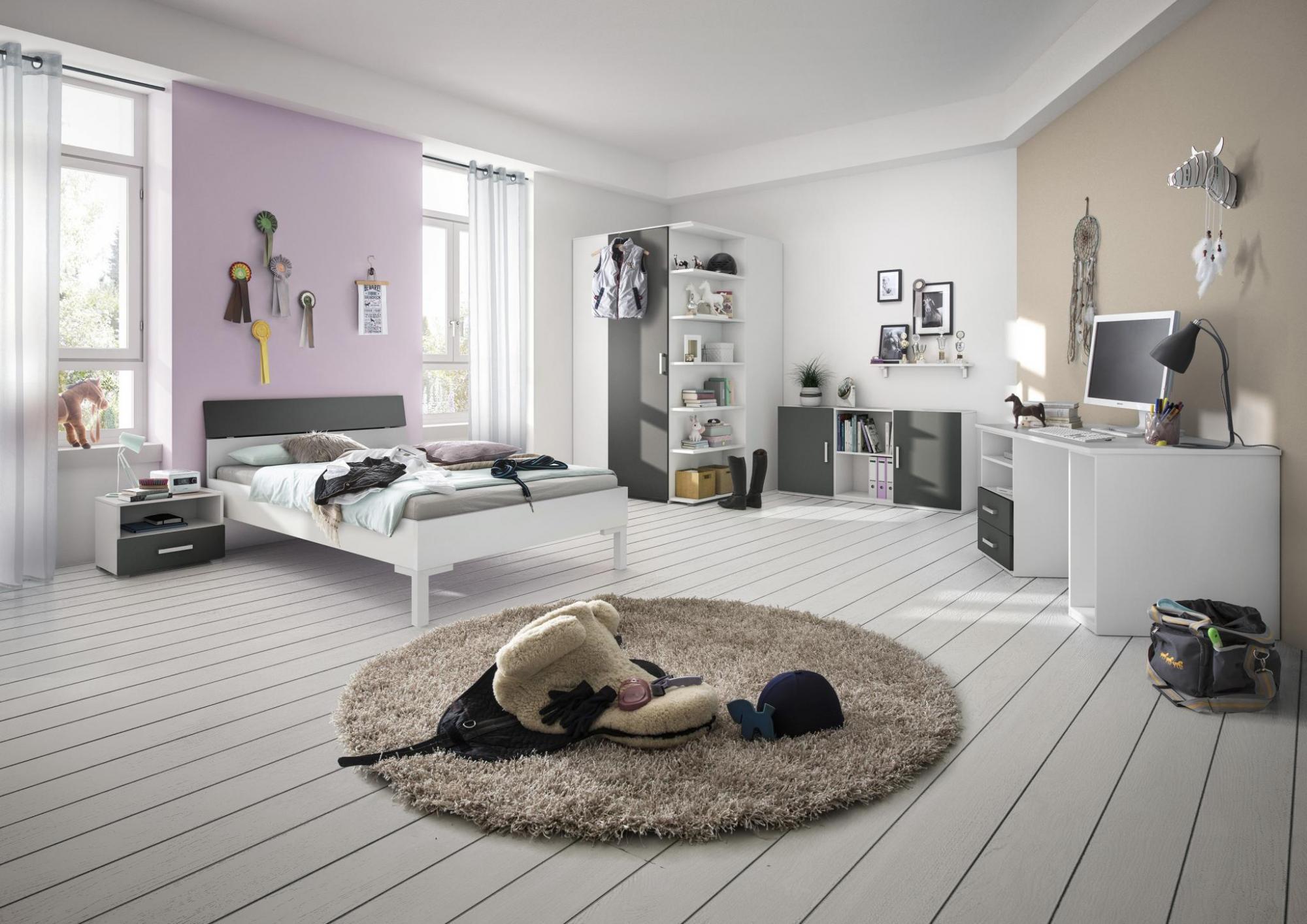 Röhr Bush cadre | Jugendzimmer | weiß - anthrazit Helles Jugendzimmer mit Bett, Schreibtisch, Regalen und Teppich, dekoriert mit Accessoires und Fotos.