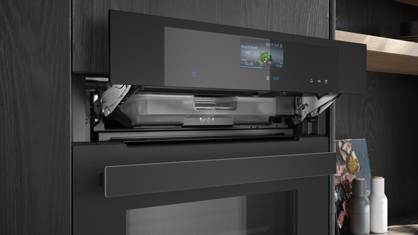 Detailansicht des Siemens TFT-Touchdisplays Pro mit farbiger Anzeige der Heizmodi und intuitiver Benutzeroberfläche.