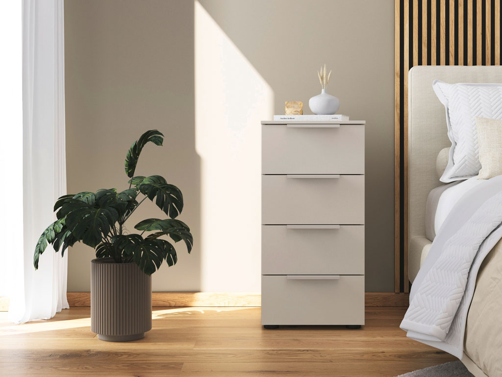 grauer nachttisch mit vier schubkästen platziert neben einem bett in einem modernen zimmer stilvoll dekoriert
