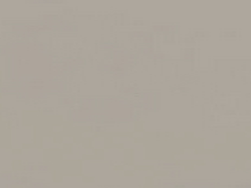 Nahaufnahme einer grauen Fliese mit glatter Oberfläche, geeignet für Wände und Böden im Innenbereich.