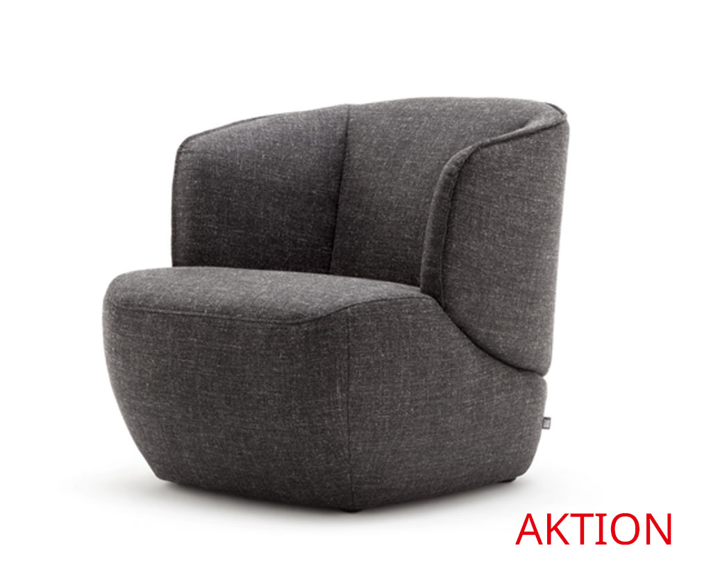Gemütlicher grauer Loungesessel mit abgerundeten Kanten und modernem Design