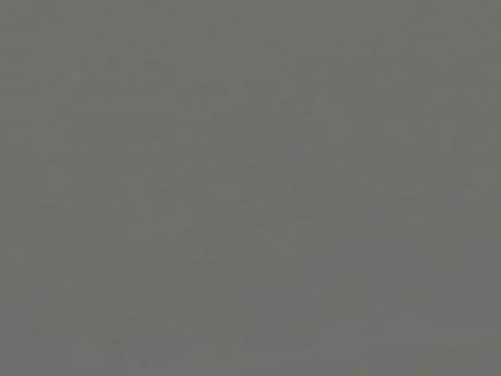 Eine schlichte, graue Wandoberfläche mit gleichmäßiger Textur