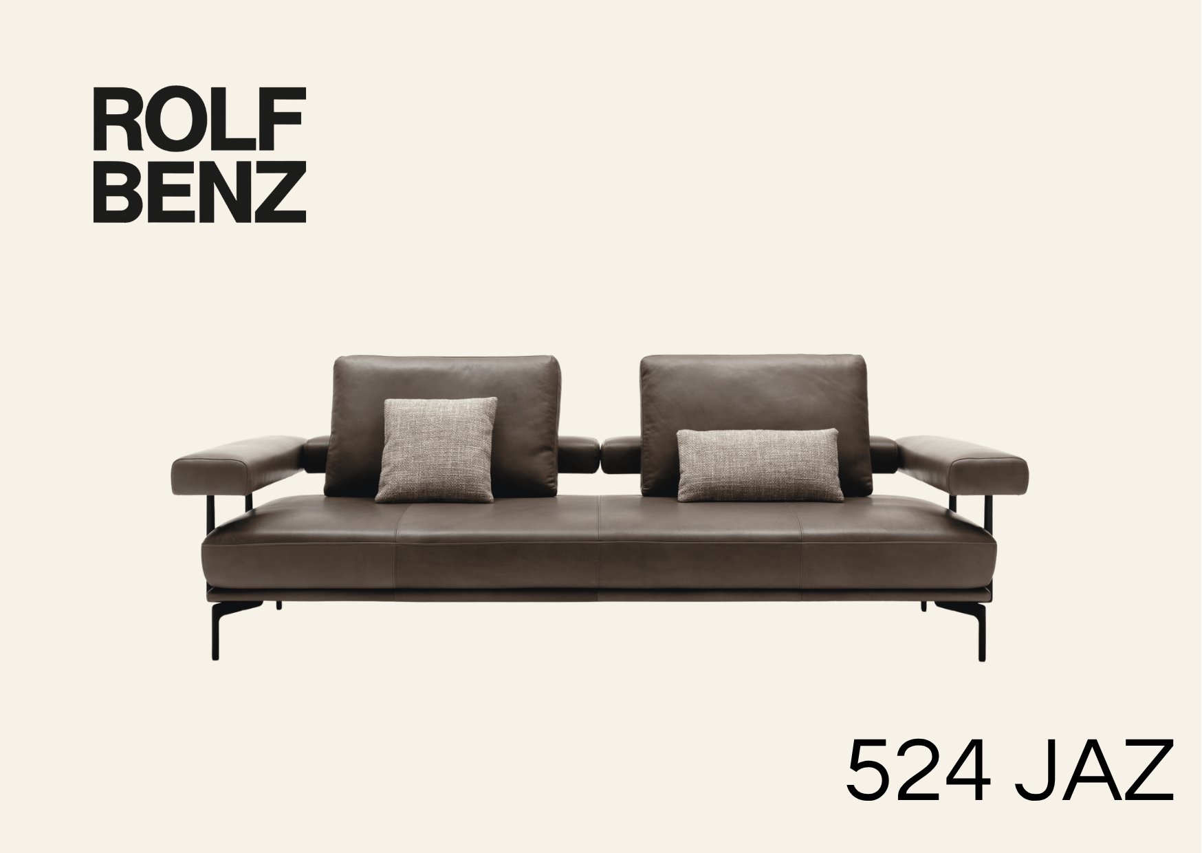 Braune Ledercouch mit luftigem Design. Aufschrift: Rolf Benz 524 Jaz.