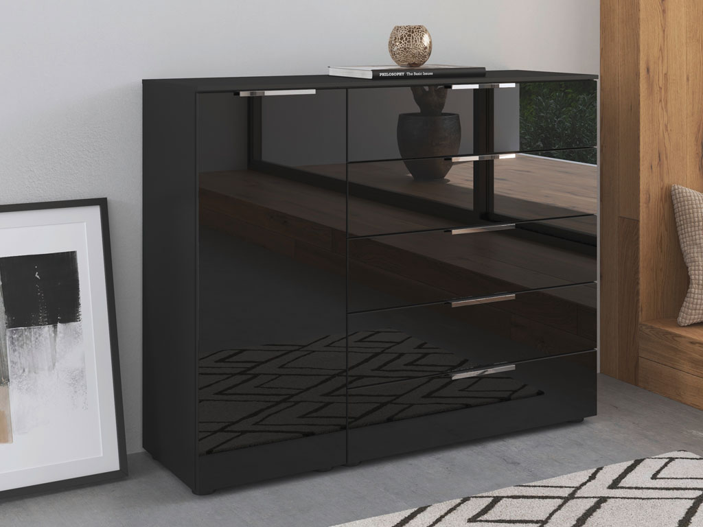 schwarze Kommode mit fünf Schubladen und einer Tür in einem modernen zimmer stilvoll dekoriert