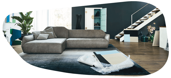 Ledercouch in grau mit Designer Rückenlehne