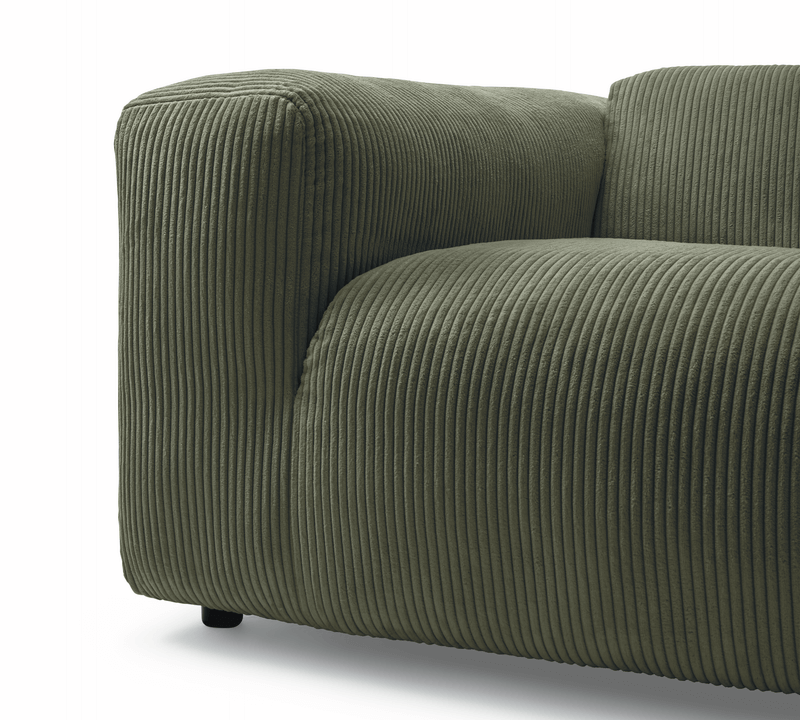 detail eines grünen cordsofas von freistil 187