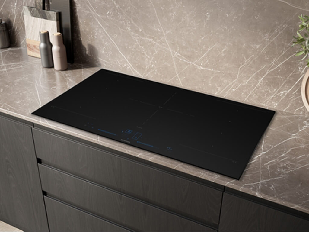 Mileubild eines Siemens studioLine Induktionskochfeldes EX97BNVV6E in einer Mamorplatte.