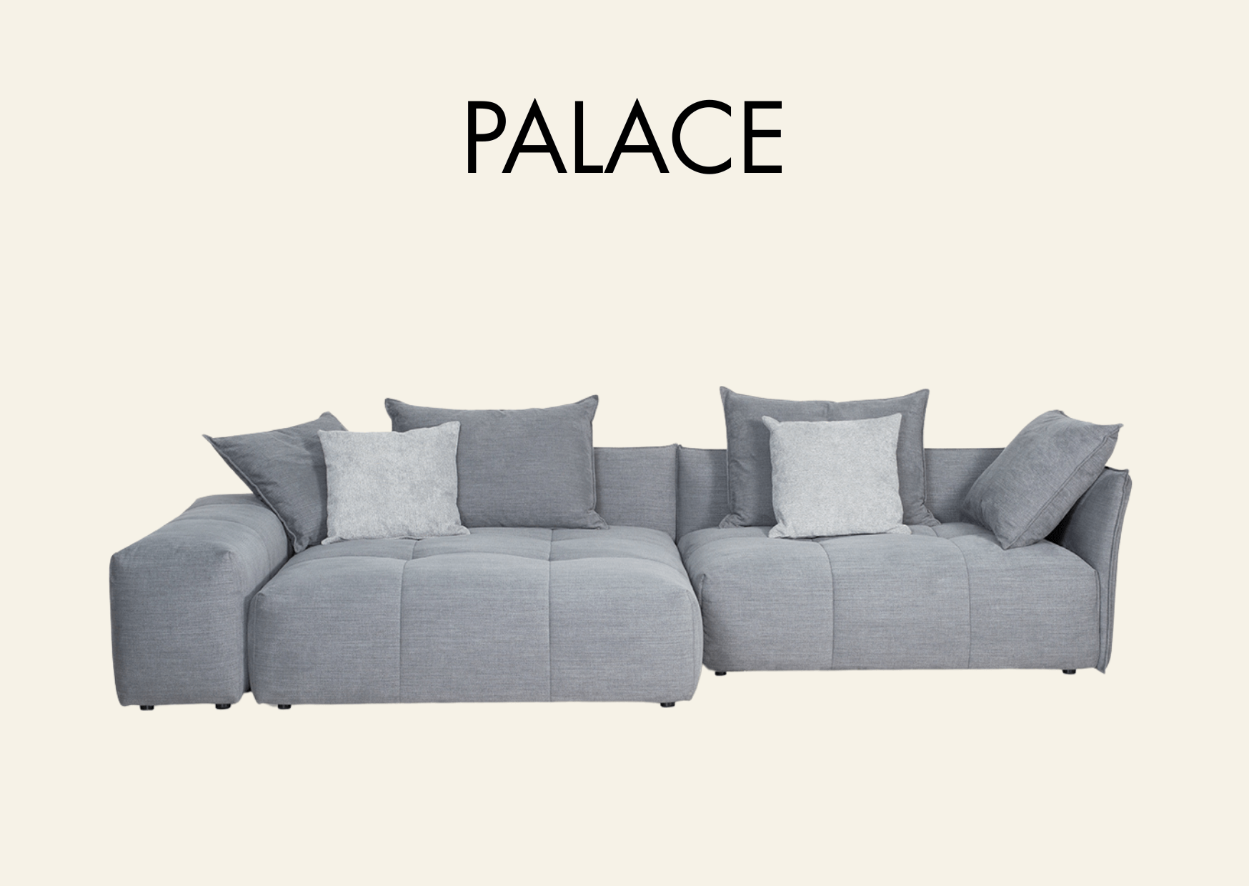 hellgraue Couch mit Karo-Steppung und Aufschrift "Palace"