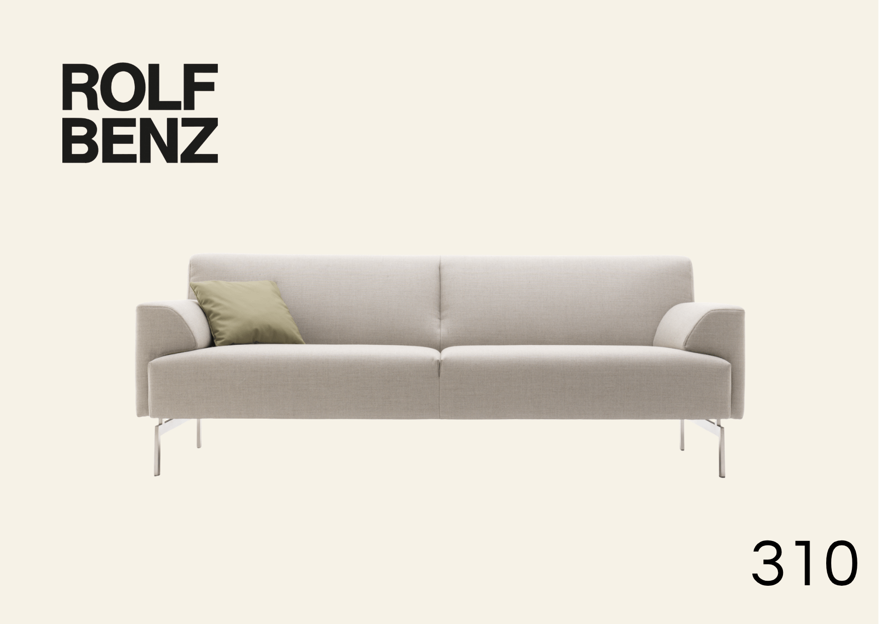 weiß/beige Polsterbank mit grünem Kissen. Aufschrift Bild: Rolf Benz 310.