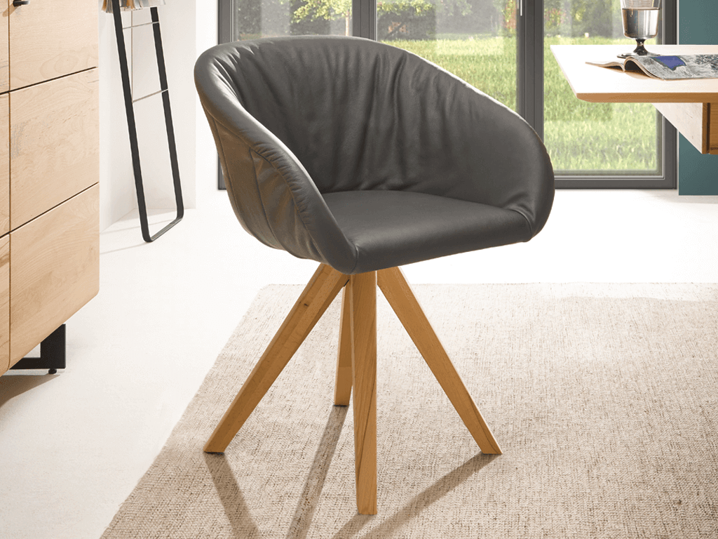 Polstersessel mit Lederbezug in grau und vierfuß Holzgestell