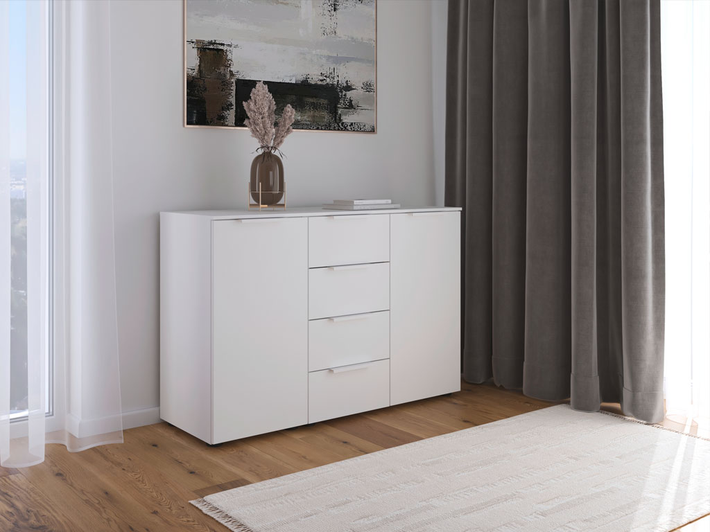 weiße Kommode mit vier Schubladen und zwei Drehtüren in einem modernen zimmer stilvoll dekoriert