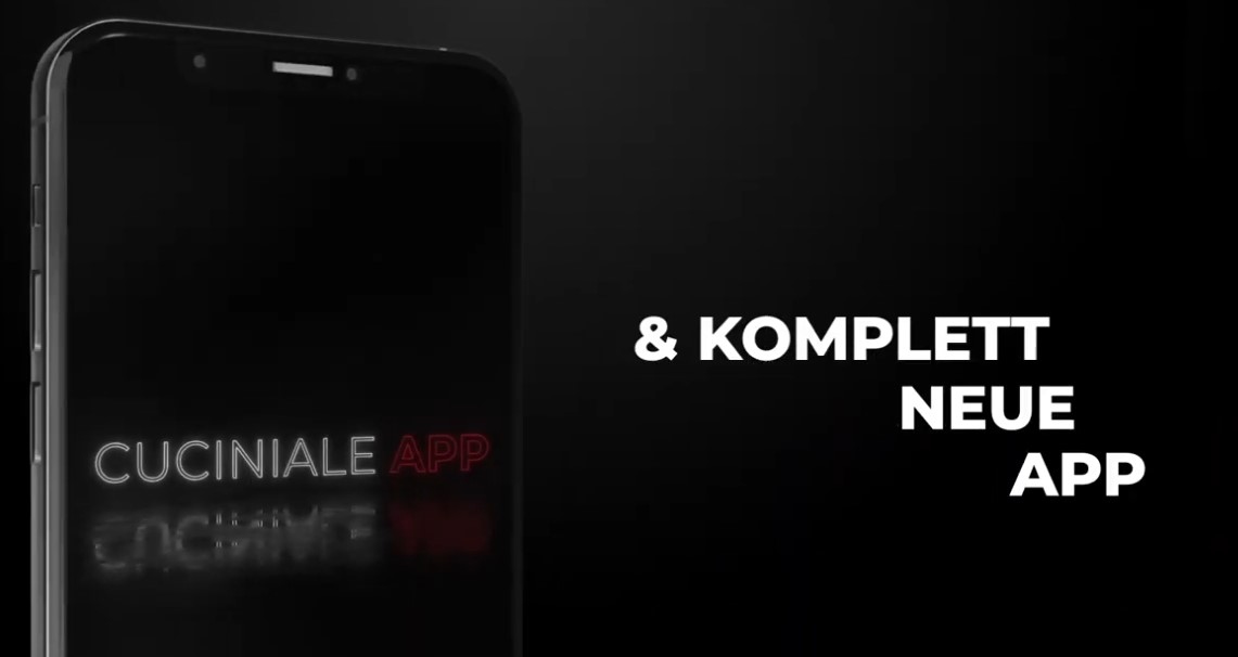 Nahaufnahme eines Smartphones mit der neuen Cuciniale App und der Aufschrift 'Komplett neue App' auf schwarzem Hintergrund