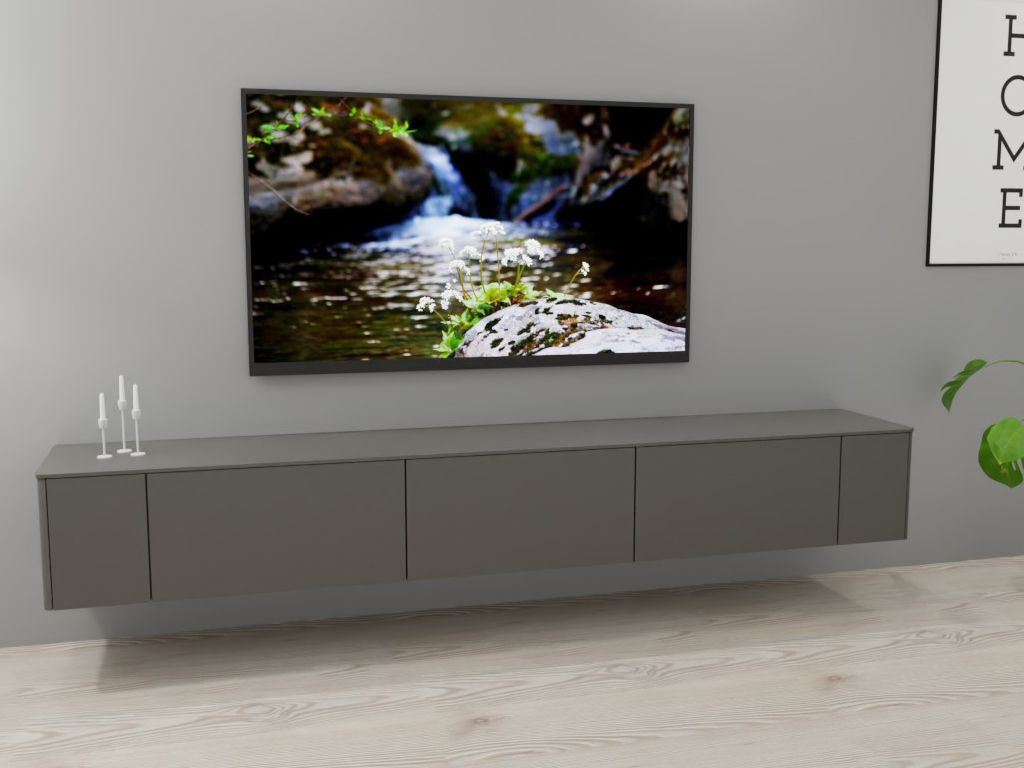 Sudbrock Goya - Lowboard | 2 Türen, 2 Klappen, 1 Schublade | B: 265,2 cm | Lack onyxgrau Elegantes Wohnzimmer mit einem schwebenden grauen Sideboard, darauf drei Kerzenhalter, ein Bild mit Landschaft darauf und ein grünes Blatt im Vordergrund.