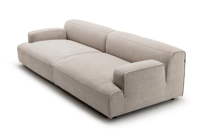 modernes graues Loungesofa vor weißem Hintergrund