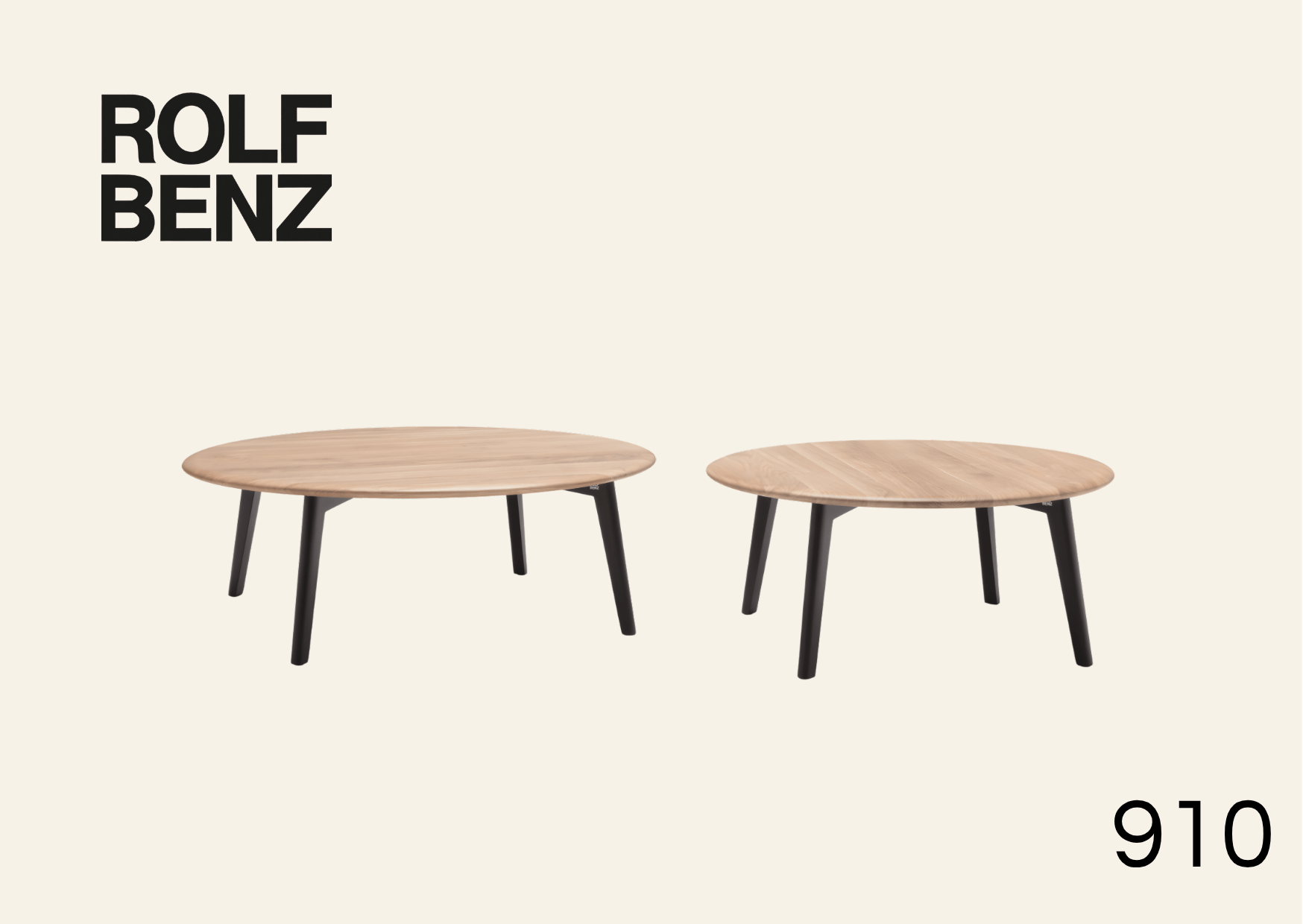 Tische rund mit Holztischplatte. Bildaufschrift: Rolf Benz 910.