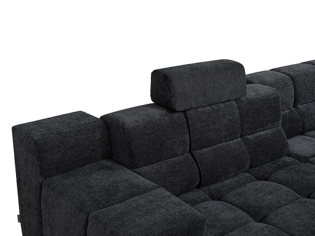 Nahaufnahme eines dunkelgrauen modularen Sofas mit verstellbarer Kopfstütze und gepolsterter Oberfläche