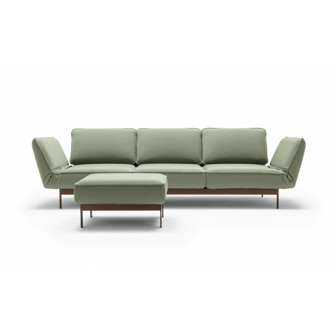 hellgrünes Sofa mit 3 Sitzen und einem Hocker