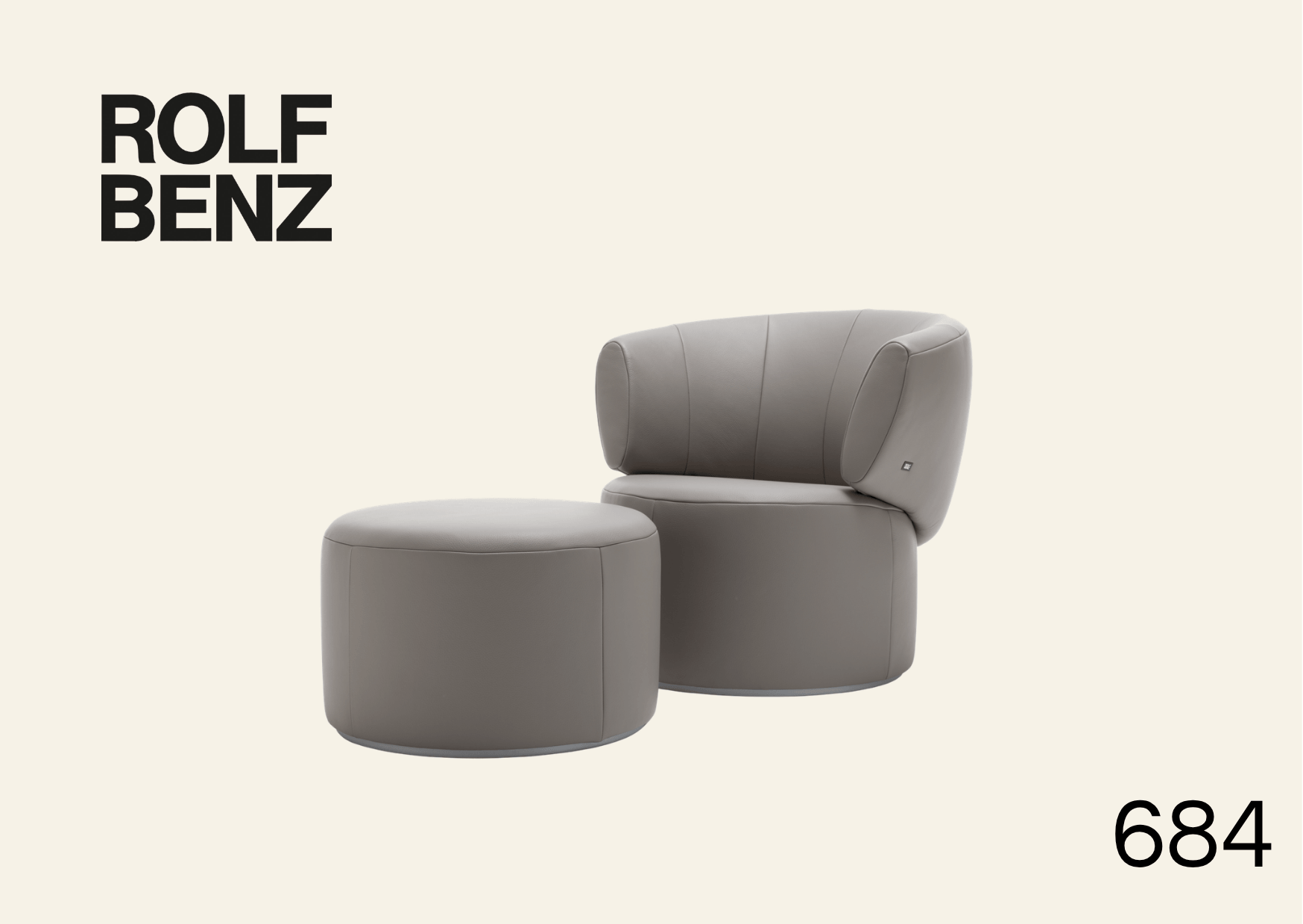 grauer Polstersessel mit passendem Hocker. Bildaufschrift: Rolf Benz 684.