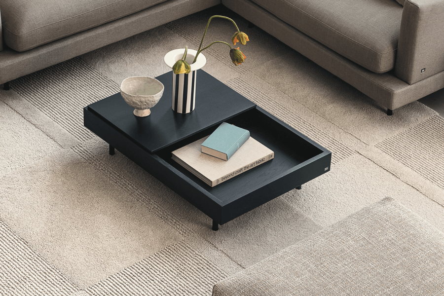 schwarzer Couchtisch mit versteckter Ablage