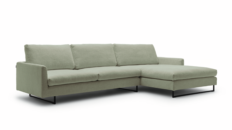 Stylisches grünes Ecksofa mit Metallbeinen