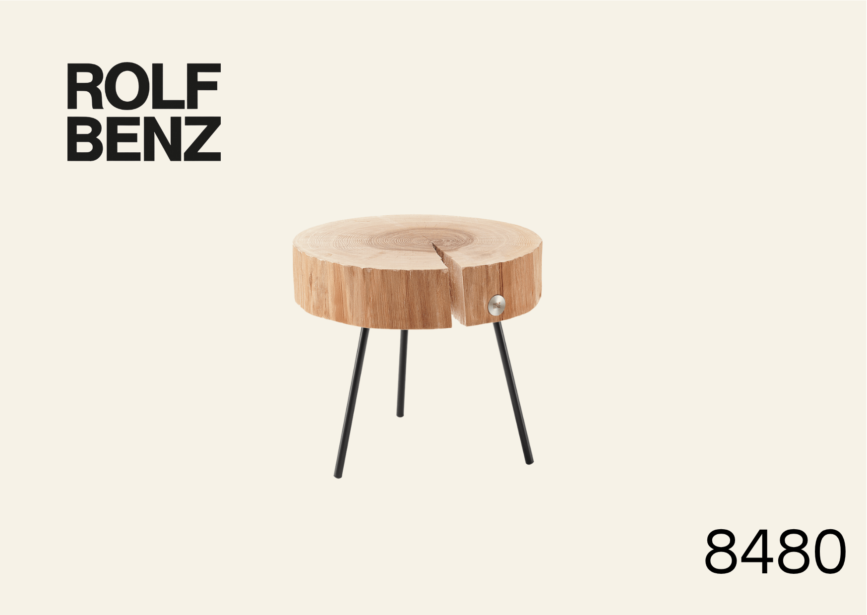 Beistelltisch mit Tischplatte aus Baumstamm. Bildaufschrift: Rolf Benz 8480.
