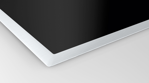 Nahaufnahme der Ecke eines Tablets mit schwarzem Display und Aluminiumrahmen