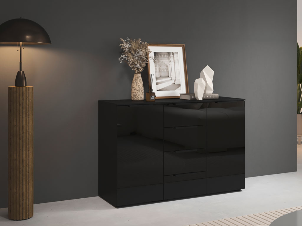 schwarze Kommode mit vier Schubladen und zwei Drehtüren in einem modernen zimmer stilvoll dekoriert