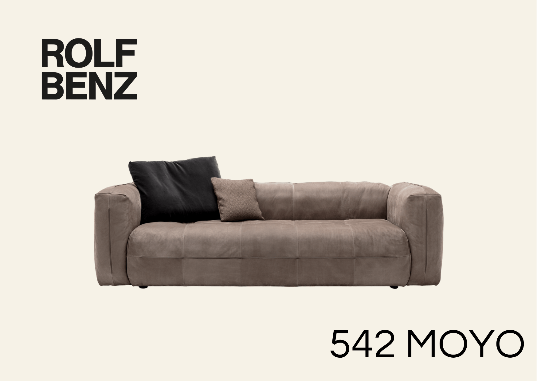 braune Couch mit breiter Polsterung. Aufschrift Bild: Rolf Benz 542 Moyo.