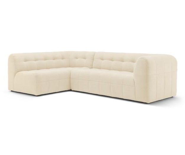 beiges Ecksofa vor weißem Hintergrund