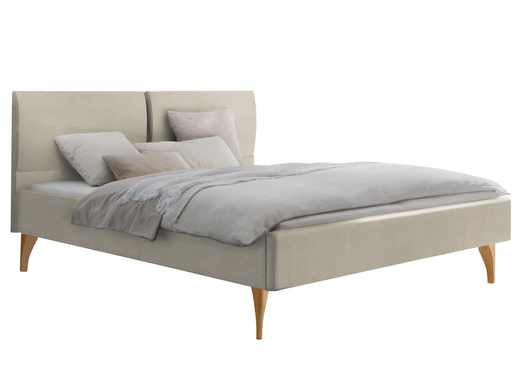 Ein beiges, gepolstertes Bett mit einem geteilten Kopfteil und hellen Holzfüßen, auf dem helles Bettzeug und Kissen liegen.
