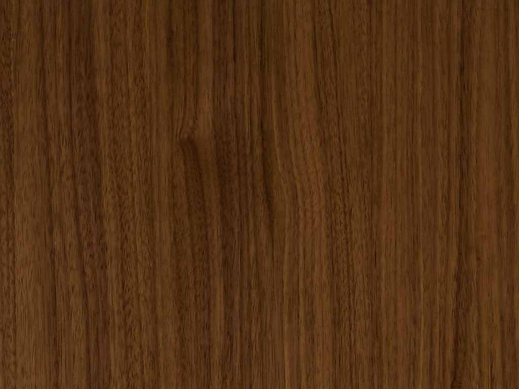 Nahaufnahme einer glatten Holzoberfläche mit Walnussmaserung