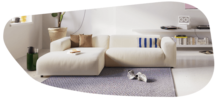 Cordsofa in creme weiß.