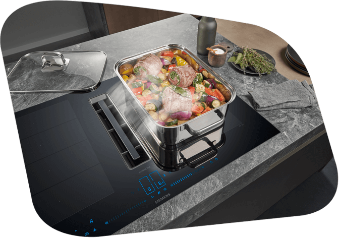 Siemens Kochfeld mit integrierten Dunstabzug, welcher Dunst und Kochgerüche aufsaugt & reinigt.