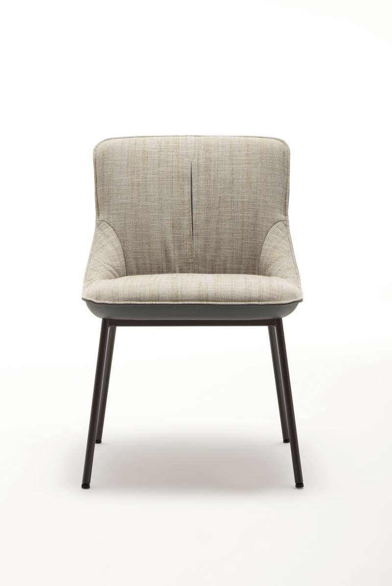 Stilvoller moderner Polsterstuhl mit beigem Stoffbezug und schlanken schwarzen Metallbeinen, ideal für Esszimmer oder Büroeinrichtung