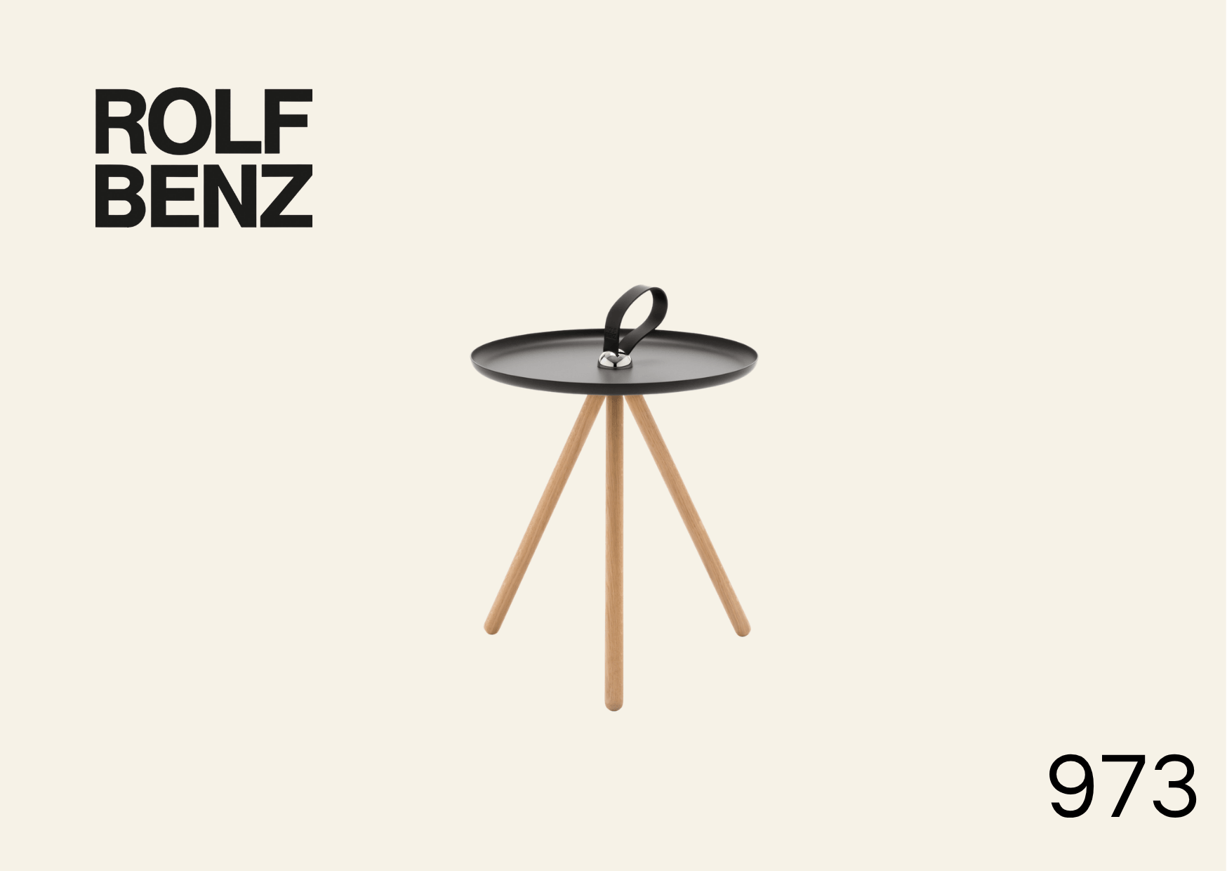 Beistelltisch mit Tragegriff. Bildaufschrift: Rolf Benz 973.