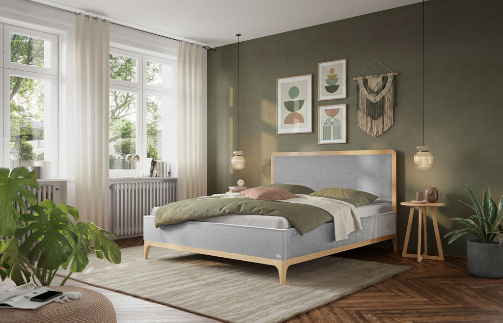Eingerichtetes Schlafzimmer mit hellgrauem Polsterbett, Holzrahmen aus heller Eiche, Teppich und gemütlicher Raumdekoration (KI-generiert)