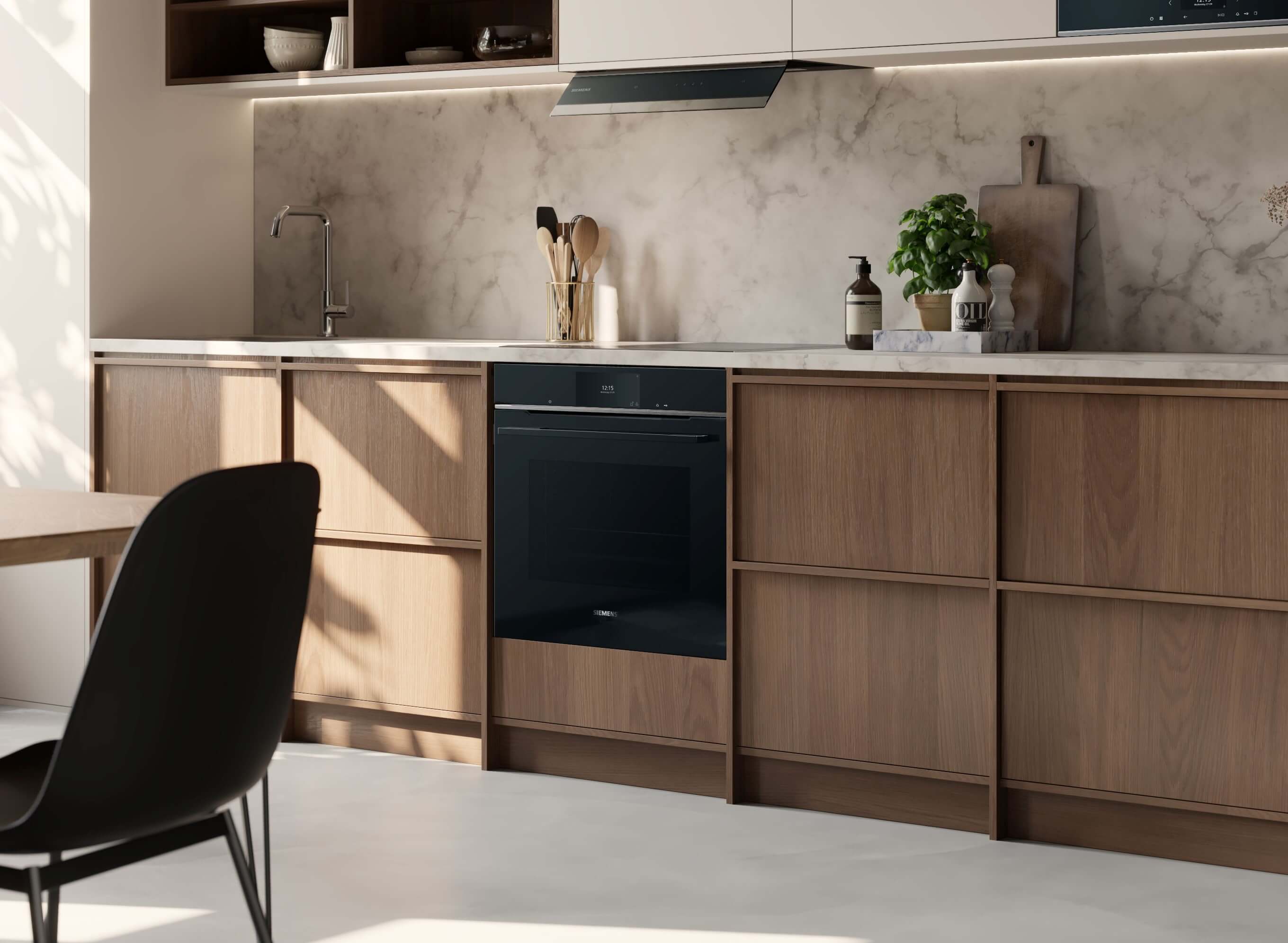 Braune Küchenfront mit eingebauten Backofen- und Herdset von Siemens powerLine.