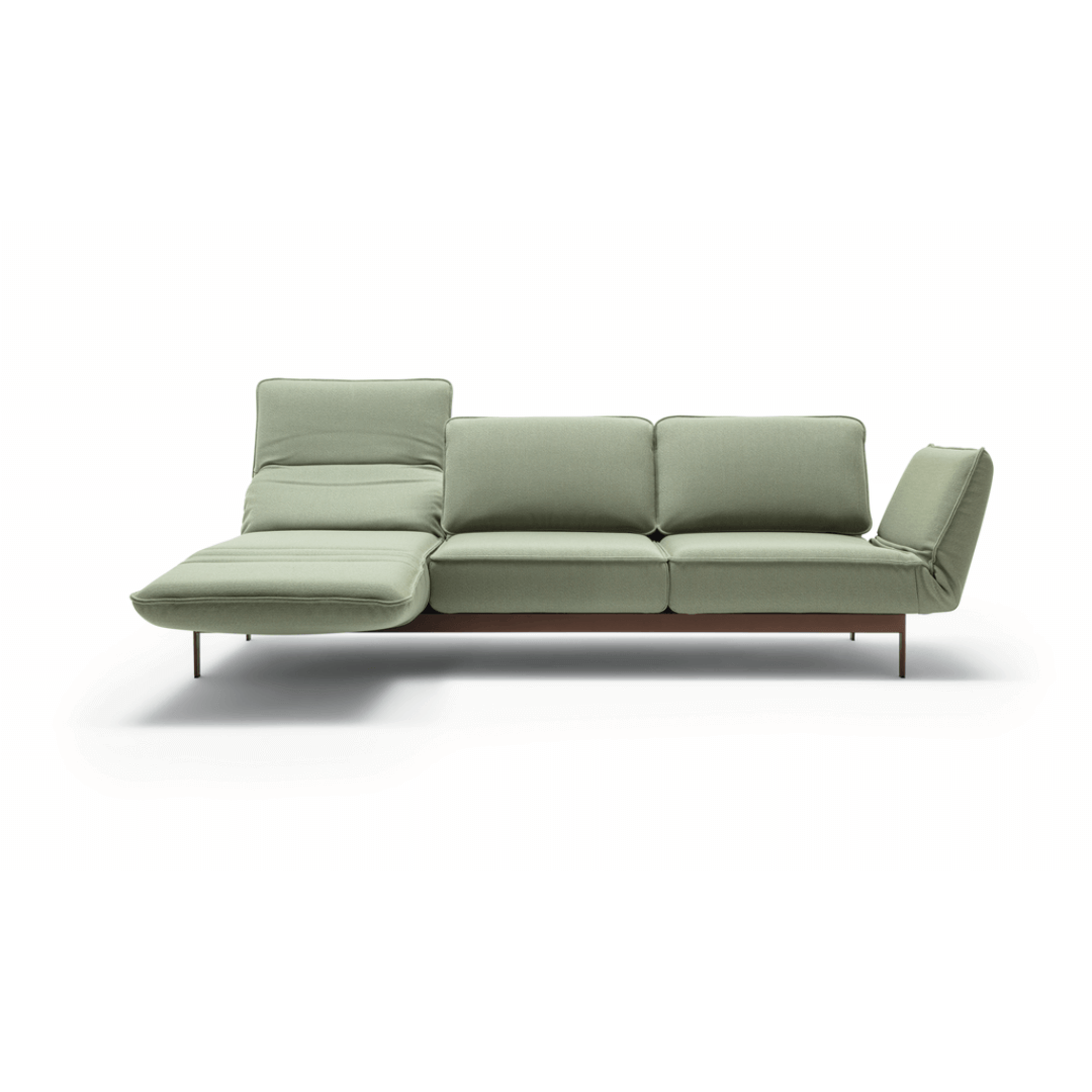 hellgrünes Sofa mit einem Longchair und einem Armlehnenteil