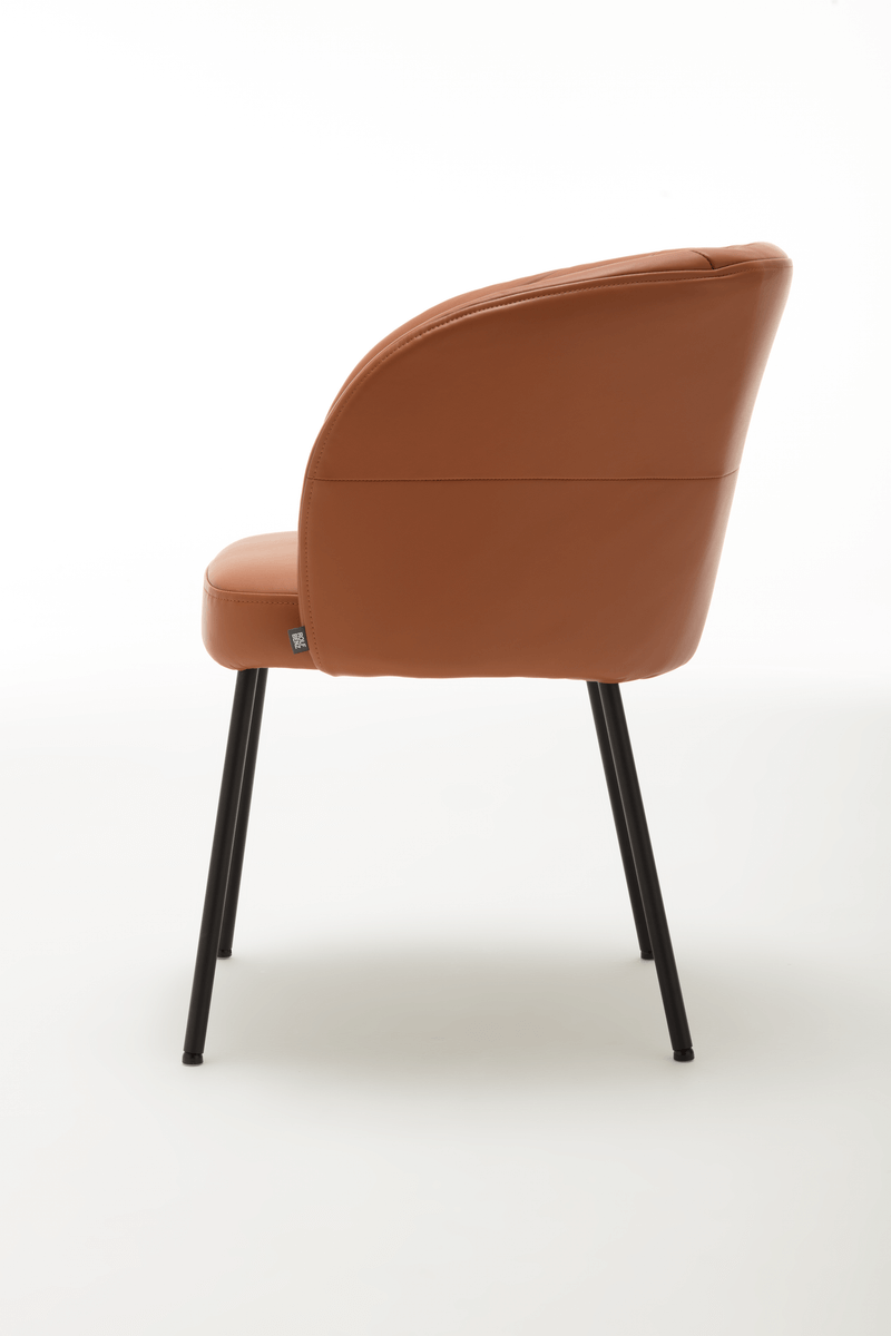 Polsterstuhl mit Rücken- und Armlehnen in einem Stück, geschwungen und nach vorne auslaufend