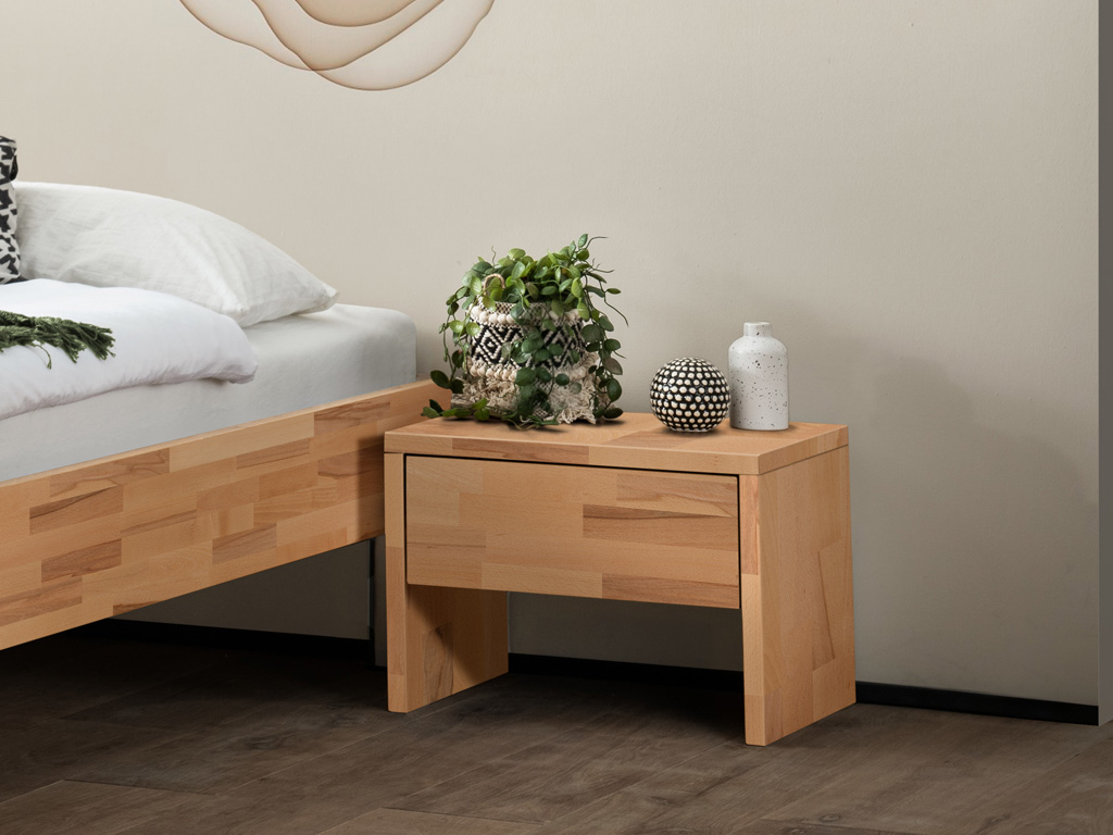 brauner nachttisch mit einer schublade stilvoll dekoriert in einem hellen zimmer savla von hasena