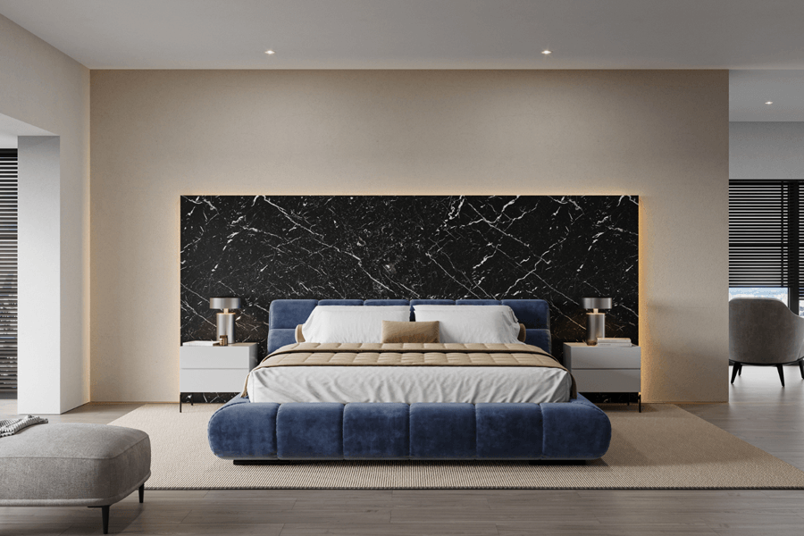 blaues Polsterbett mit Ziernaht