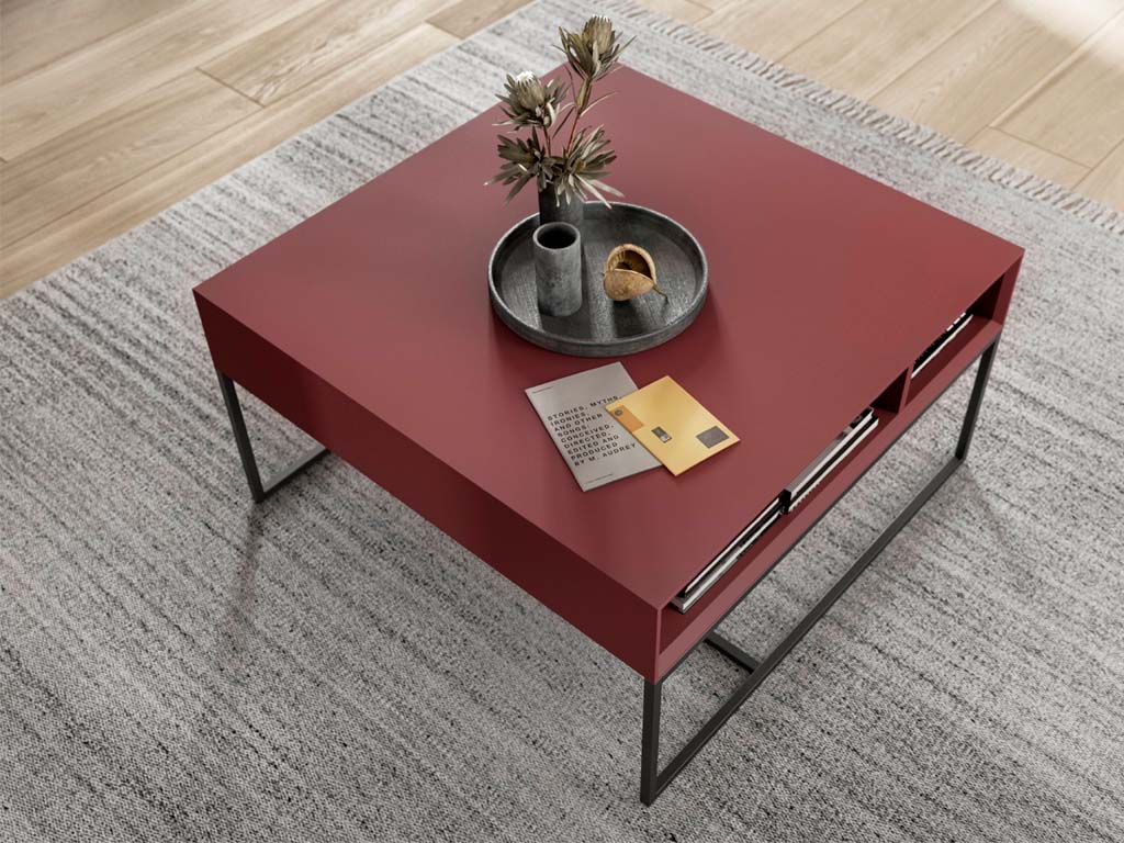 roter couchtisch mit stauraumfächer und schwarzem metallgestell