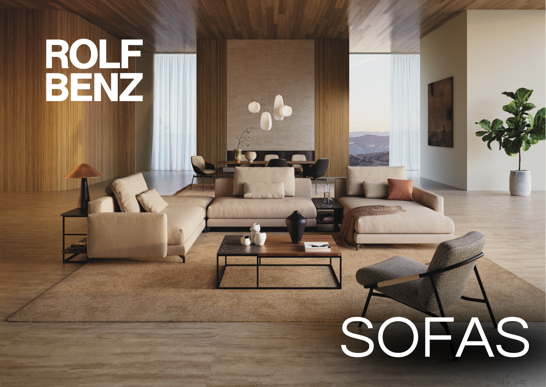 Wohnzimmer mit beiger Wohnlandschaft und Beimöbel. Aufschrift: Rolf Benz Sofas.