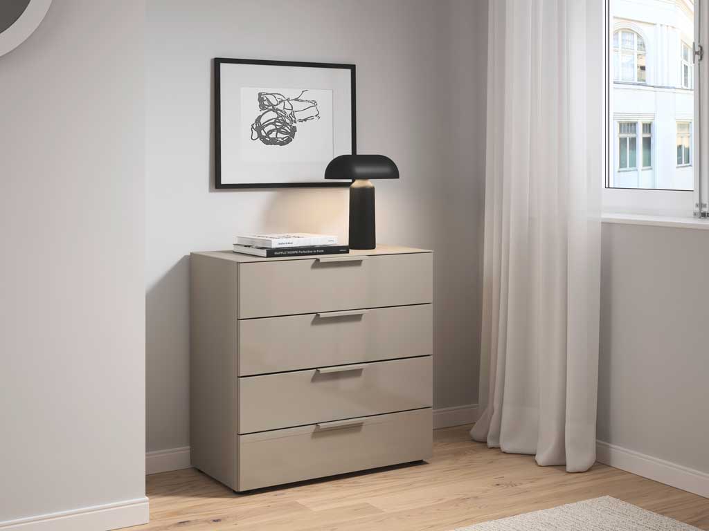 graue kommode mit vier schubkästen platziert in einem modernen zimmer stilvoll dekoriert